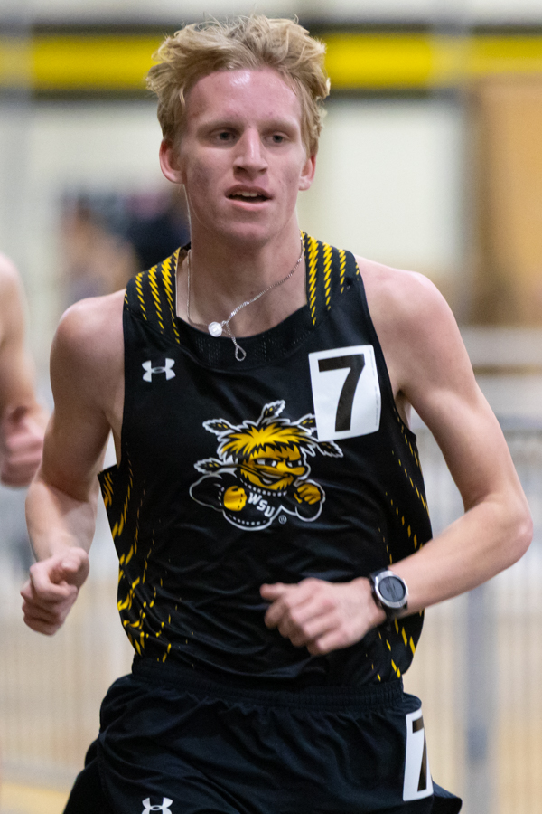 Freshman Bennett Meoli finishes the 5000 meter race at the Wilson Invitational on Jan. 26. Meoli placed fifth overall with a time of 15:35.57.