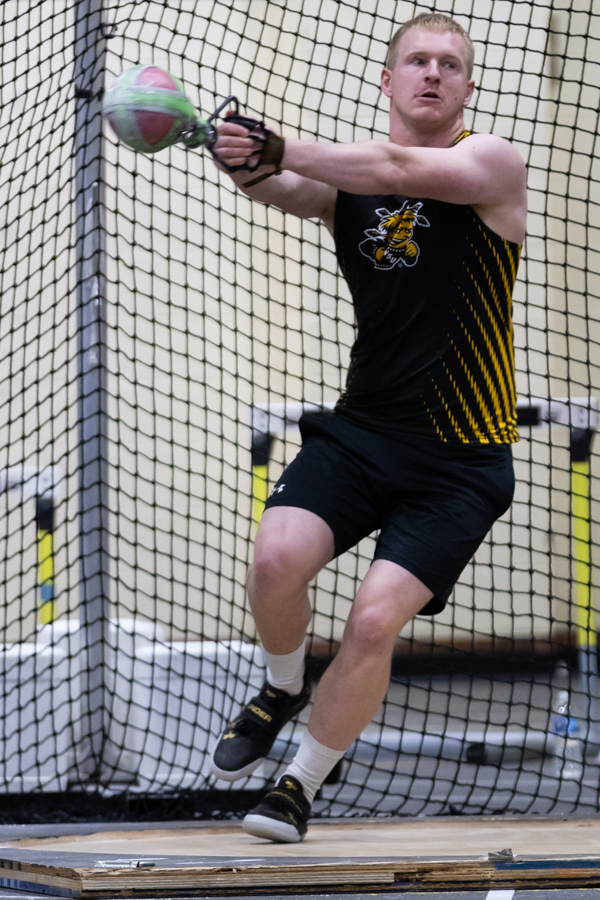 Junior thrower Creighton Camp prepares for his second weight throw on Jan. 26 at the Wilson Invitational. Camp has competed for Wichita State since his freshman year.