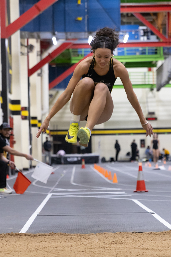 Sonya Haylor, a freshman sprinter and jumper goes for her first triple jump mark on Jan. 26. Haylor finished fifth with a jump of 35 feet, seven and three-quarter inches.