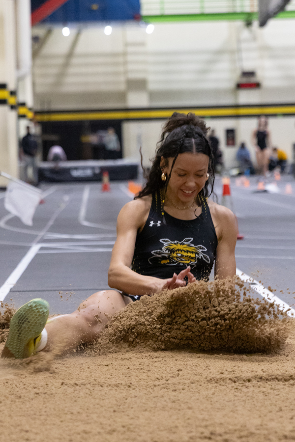 Freshman Sonya Haylor finishes a jump in the triple jump on Jan. 26 at the Wilson Invitational. Haylor finished fifth overall in triple jump.