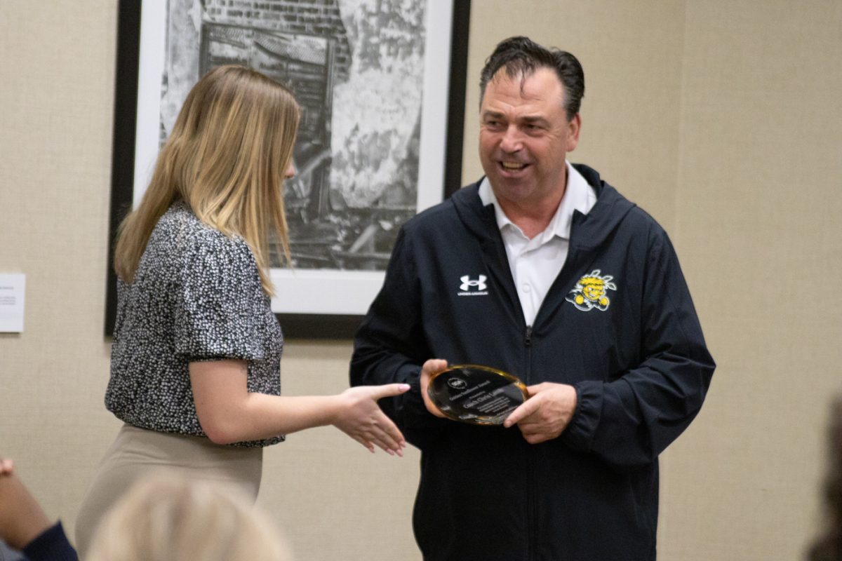 Wichita State womens volleyball head coach Chris Lamb accepts the 2024 Golden Sunflower Award. This new award, which was introduced for the first time last year, honored Lamb for his contributions to the university.