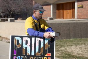 Nicholas Heald, a member of Abolitionists Rising, protested abortion and LGBTQ+ rights outside of the Rhatigan Student Center on Tuesday, Feb. 20. My ultimate goal out here is to glorify God, Heald said.