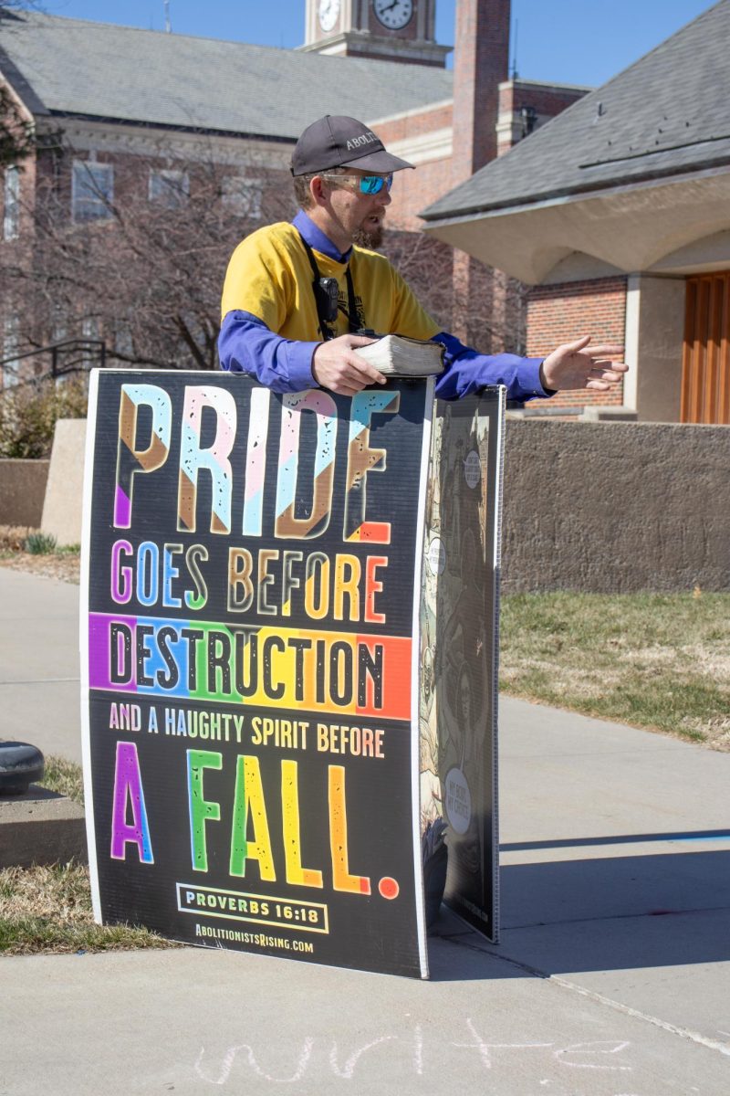 Nicholas Heald preaches to students while protesting LGBTQ+ rights and abortion. Heald identified as an abolitionist. Were seeking to abolish child sacrifice from the land, Heald said. 