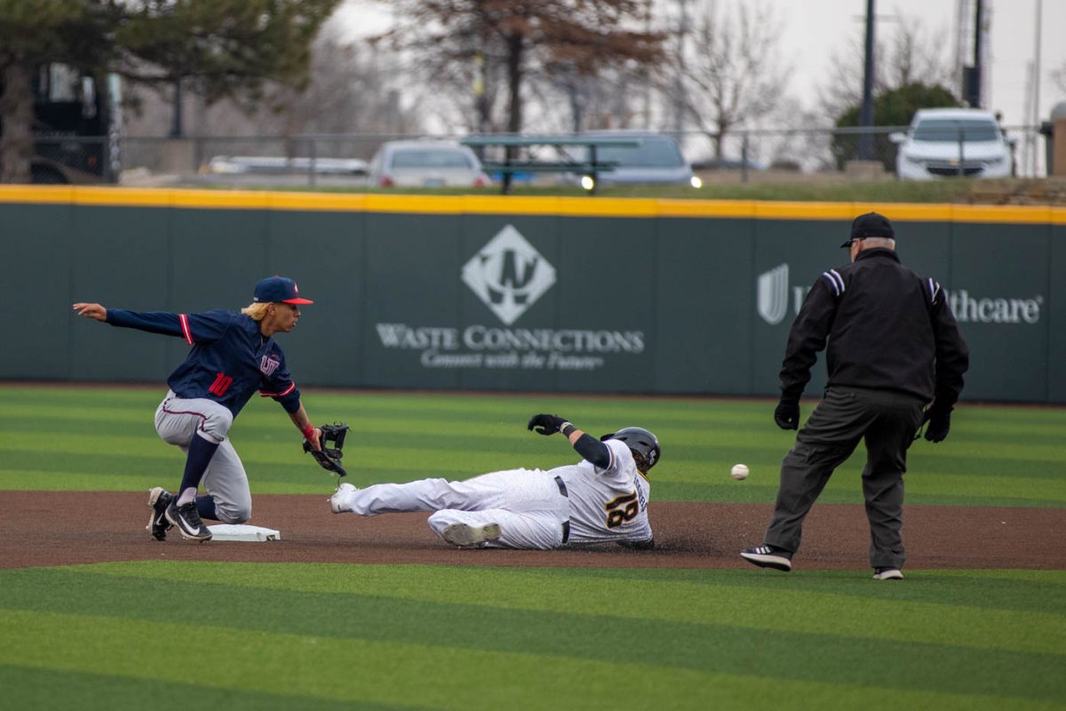 Jordan Rodgers slides into second base on March 1 against Utah Tech.
