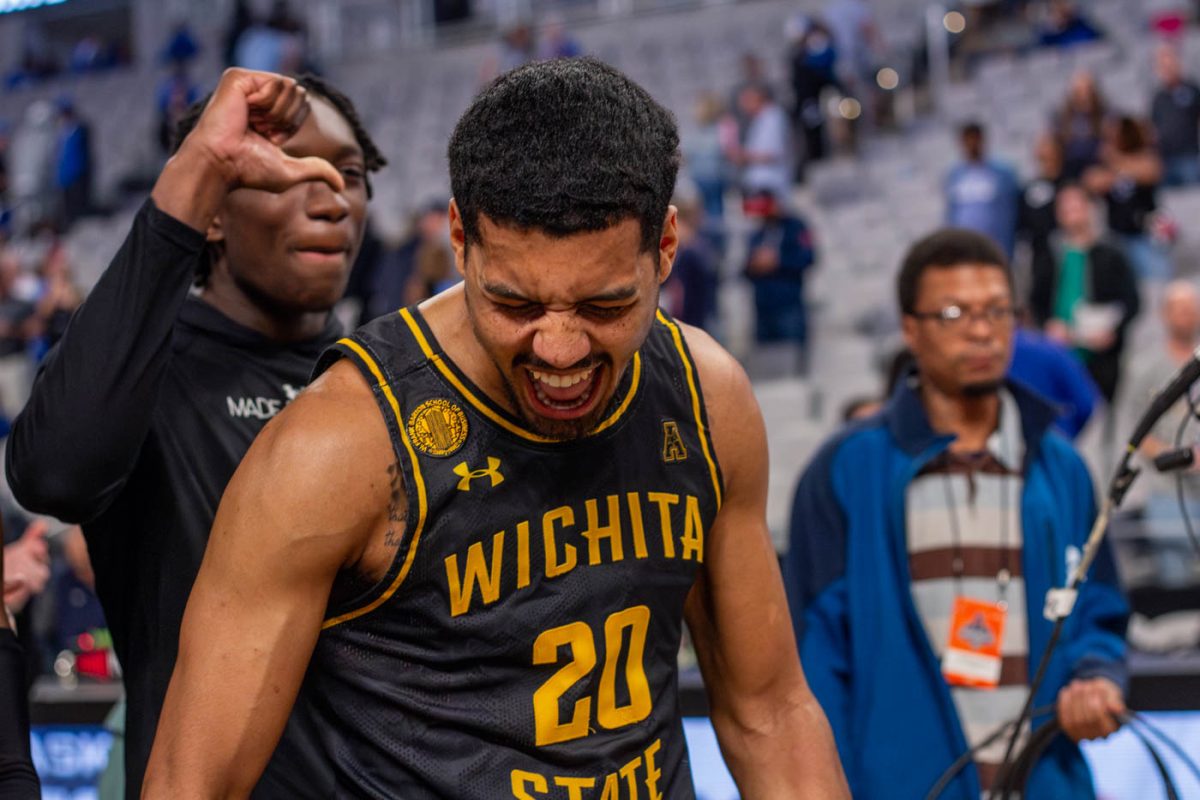 Harlond Beverly yells after the Shockers win against Memphis on March 14. The team will face UAB in their next round of competition.