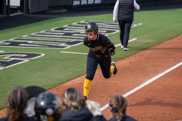 Senior Addison Barnard screams and runs to home plate after hitting a home run on March 23 against UTSA. Barnard had two home runs in the game.
