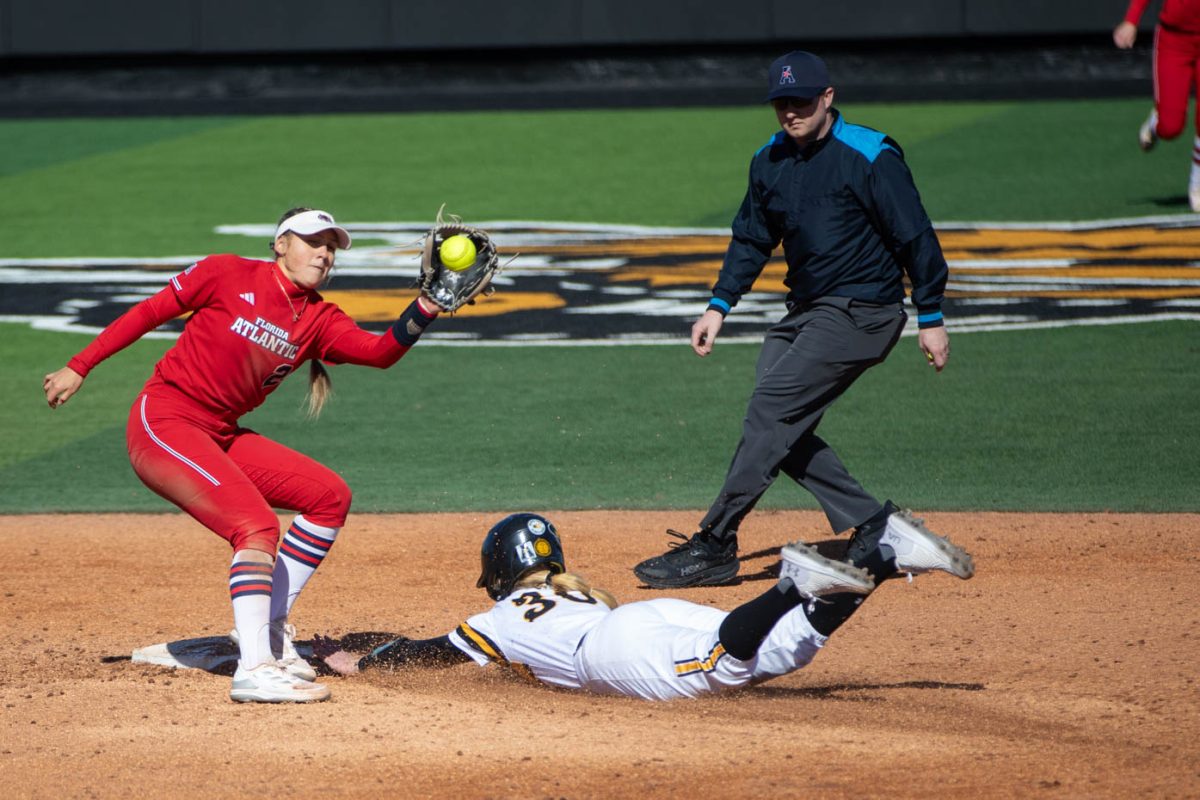Addison Barnard slides into second after hitting a double against Florida Atlantic on March 9.