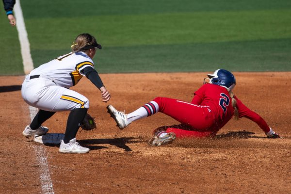 Krystin Nelson gets ready to tag a player from Florida Atlantic on March 9.