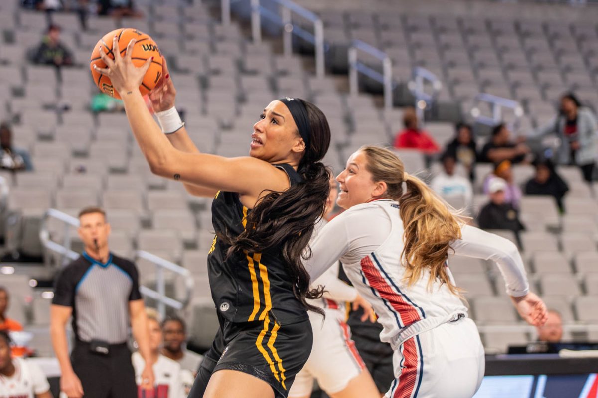 Daniela Abies rebounds the ball during the first quarter against Florida Atlantic. Wichita State defeated FAU in the first round of the American Athletic Conference tournament.