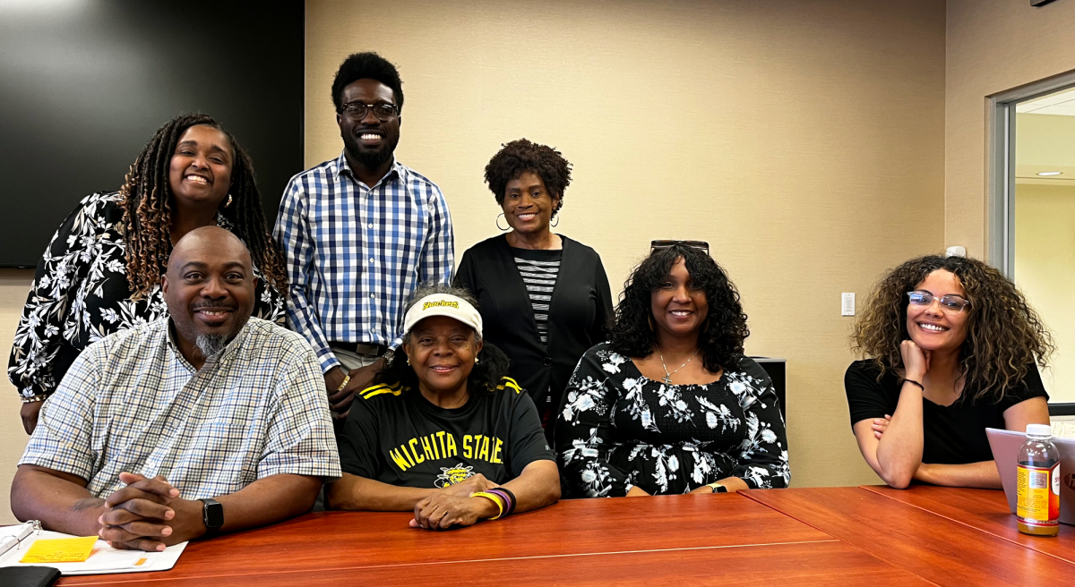 Members of the African American Faculty Staff Association pose for a photo.