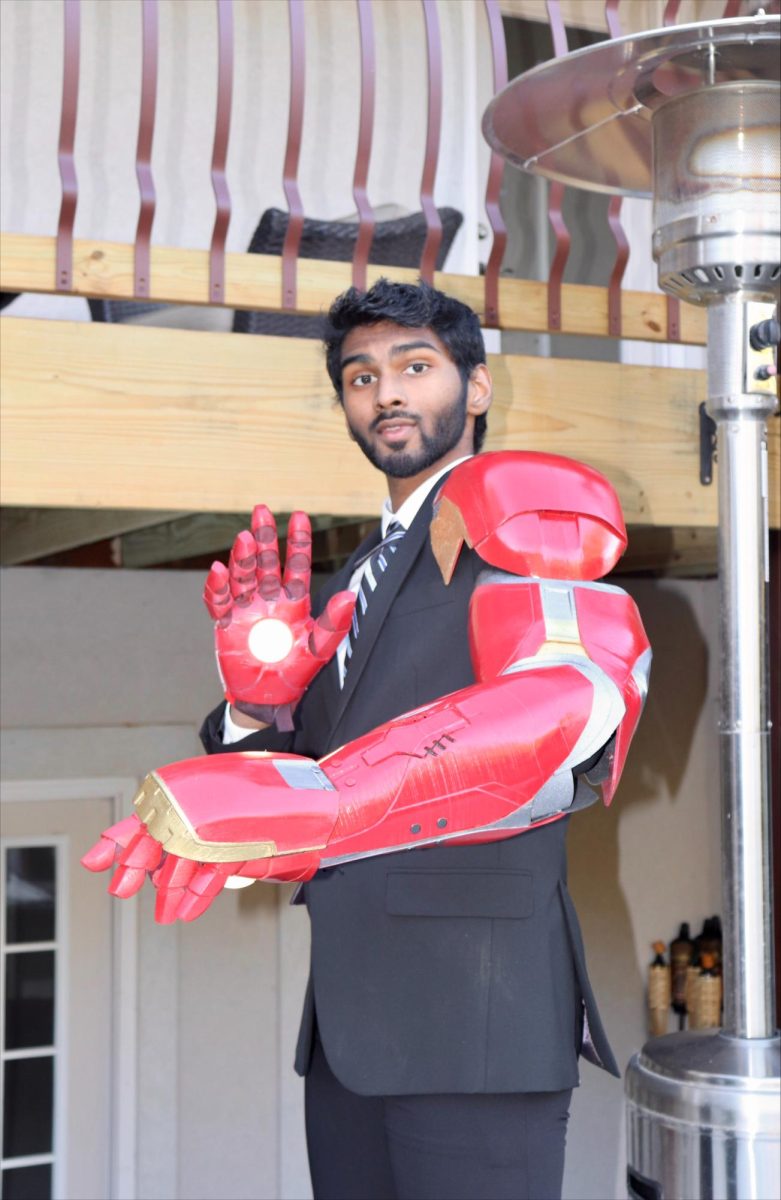 Dimitri Seneviratne poses for photo in his Iron Man suit. Photo courtesy of Seneviratne.