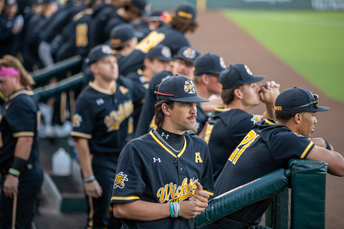 The Wichita State baseball team watches on in the dugout during a game against Nebraska on March 12.