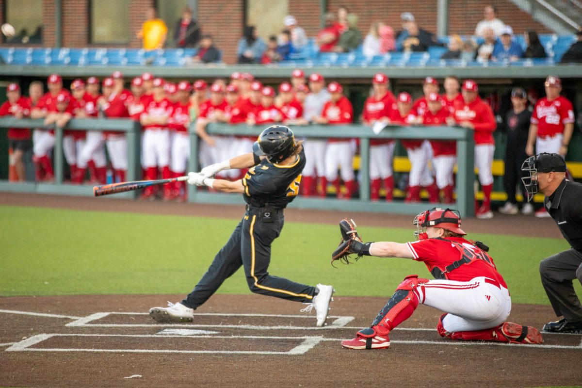 Camden Johnson swings at a pitch during a game against Nebraska on March 12.
