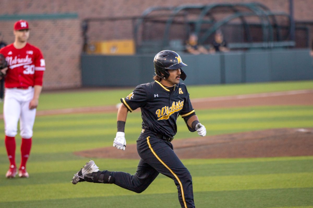 Mauricio Millan runs to first base after being hit by a pitch during a game against Nebraska on March 12.