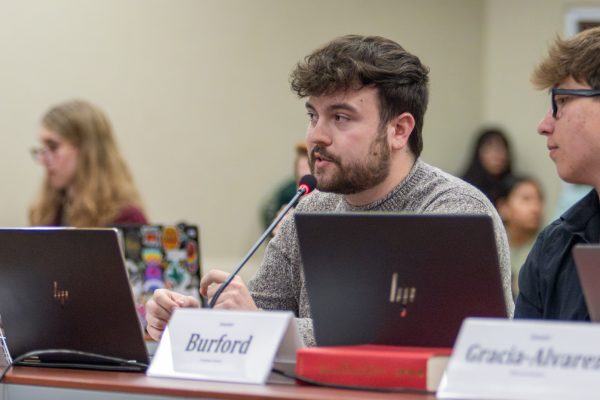 Jay Thompson, head of the government oversight committee, speaks on the Association Funding Regulations Act during the Student Senate meeting on Wednesday, March 27. The bill will supply all registered student organization (RSO) safekeeping accounts with $250 per year to help with startup costs