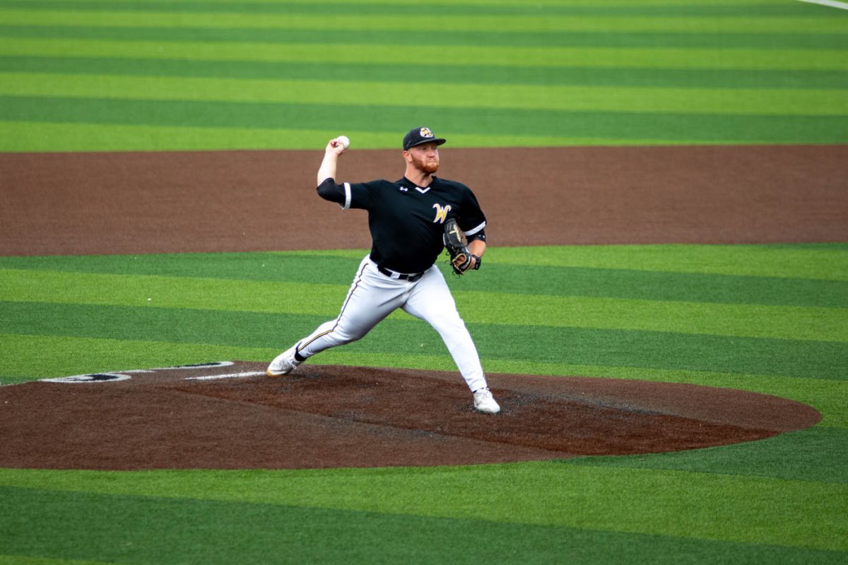 Sophmore Caleb Anderson pitches the first two innings on April 17 against ORU. Anderson let up seven hits and six runs.
