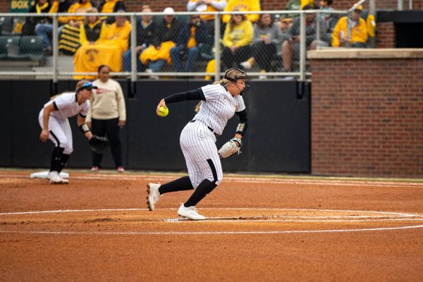 Senior Lauren Howell pitches on on April 9 against OU. Howell pitched one inning and gave up seven runs.