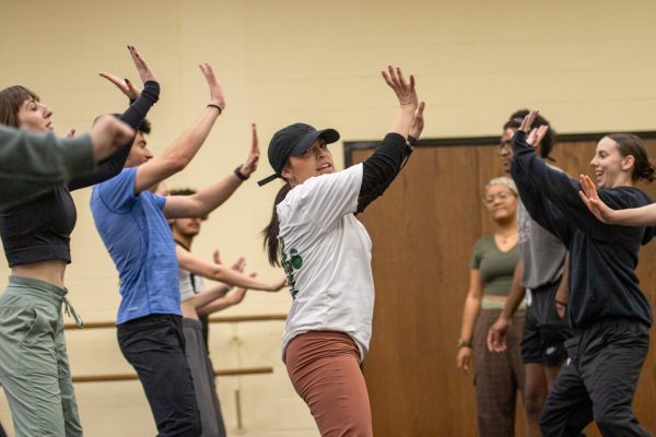 Dance instructor Amy Pollard Yarberry dances among her students.