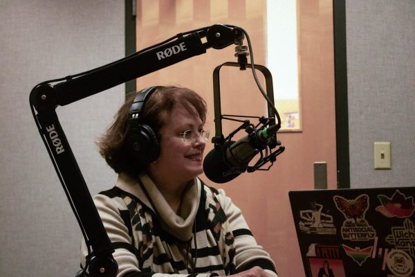 Lynne Davis, a Wichita State professor of organ, speaks on The Sunflowers podcast in Elliott Hall.