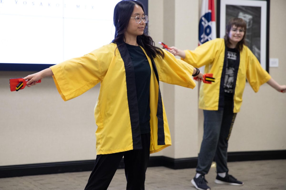 Asian Student Conference Dance president Julie Tran performs traditional Japanese Yosakoi dance at the Japan Festival. The Japan Festival was held on the second floor of the RSC on April 26 and featured traditional Japanese dance and an assortment of activities.