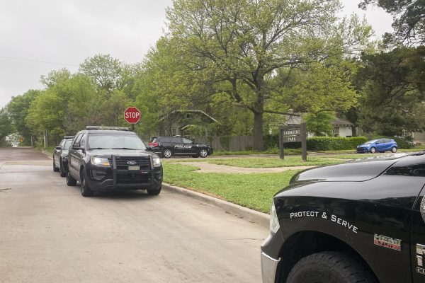 Wichita Police Department vehicles near Fairmount Park on April 18, following a shooting around 7 a.m. that morning. 