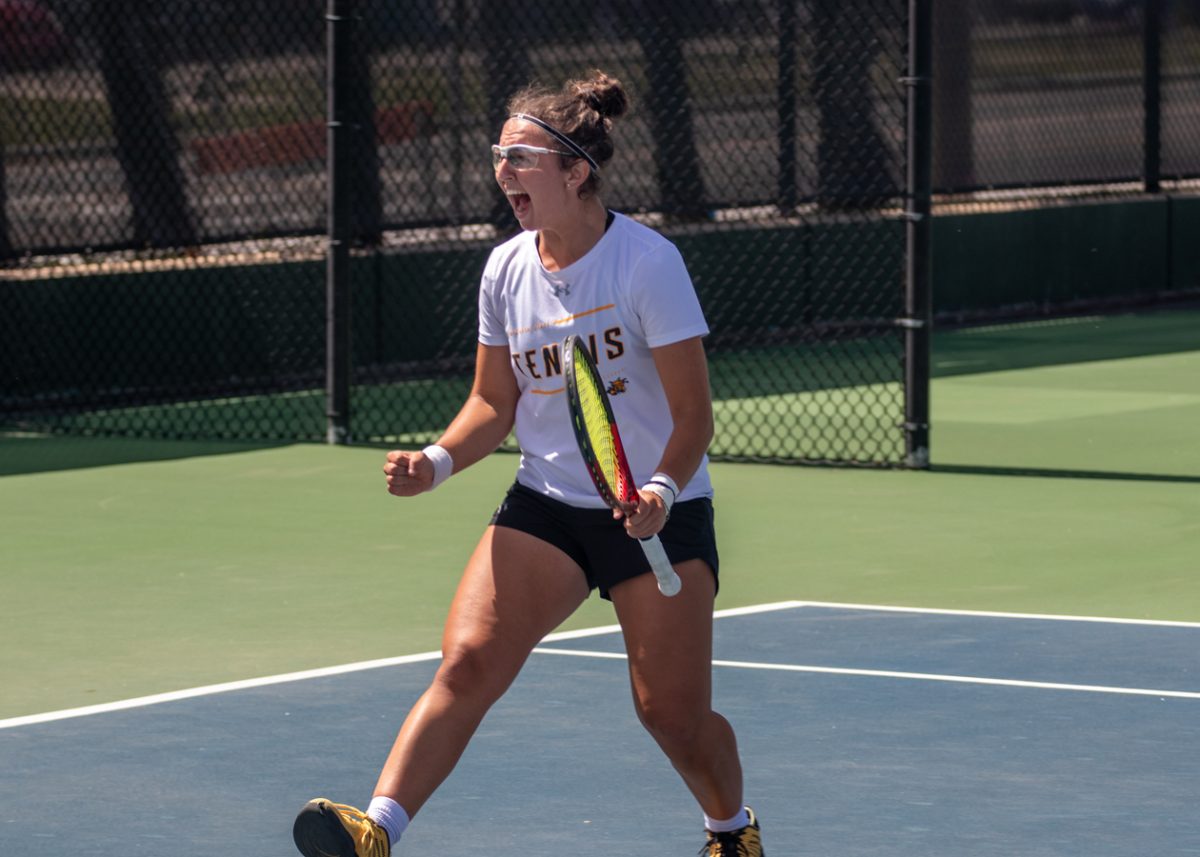 Giorgia Roselli, freshman at Wichita State, yells on court with Tulsa as the opponent team.  Roselli won the doubles match with Theodora Chantava on April 8.