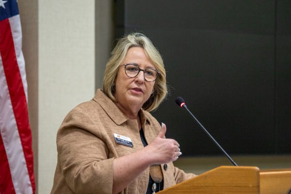 Teri Hall conveys congratulations to the newly elected Student Body President Kylee Hower and Vice President Matthew Phan at the inauguration ceremony. The inauguration took place on April 18, 2024. (File photo)