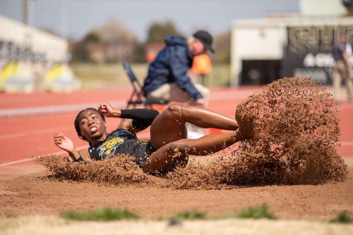 Chidera+Okoro+jumps+onto+the+sand+during+the+Shocker+Spring+Invitational+on+March+30.+Okoro+won+the+long+jump+with+the+mark+of+5.69m+18+8.