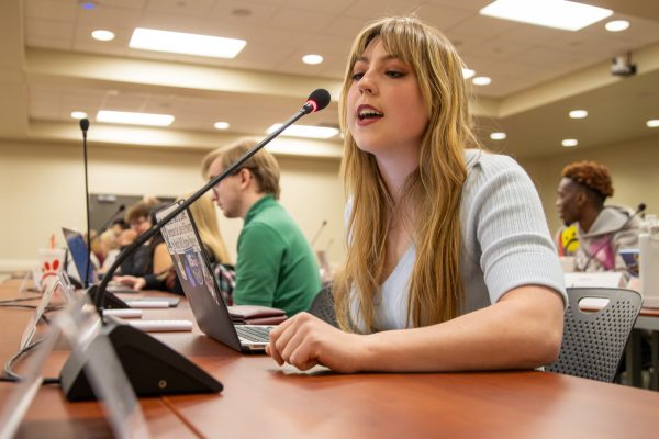 Student Government Association Sen. Gracie Lamb votes yes during the Student Services Fees Act proposed on Wednesday night. All 18 present senators voted in favor of the act, which determined how $10.5 million in student fees would be allocated among 36 programs.