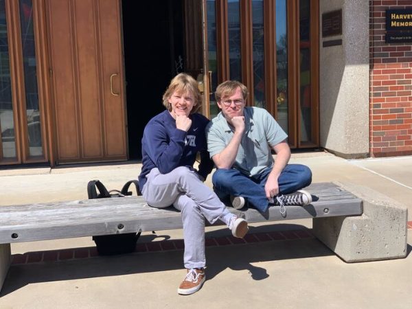 Jackson Anderson and Kyle Hall pose for a photo in front of the campus chapel. The two initiated the first meeting of Wichita States new poetry club. 