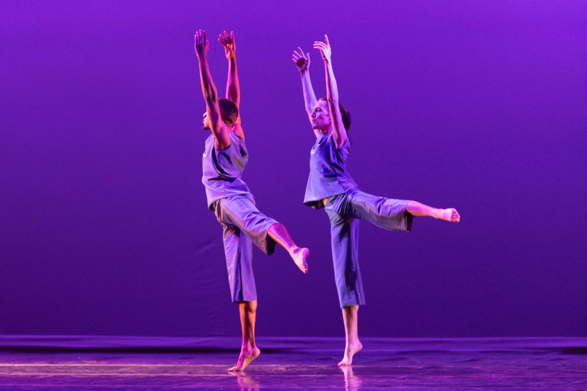 Andrae Carter and Nick Macias perform A Pale Blue Dot choreographed by Sabrina Vasquez in collaboration with the dancers at the Wichita Contemporary Dance Theatre on April 25. The dance was performed in the Wilner Auditorium.