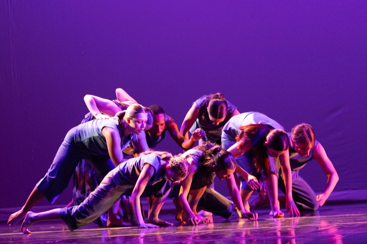 Students perform A Pale Blue Dot choreographed by Sabrina Vasquez in collaboration with the dancers at the Wichita Contemporary Dance Theatre on April 25. The dance was performed in the Wilner Auditorium.