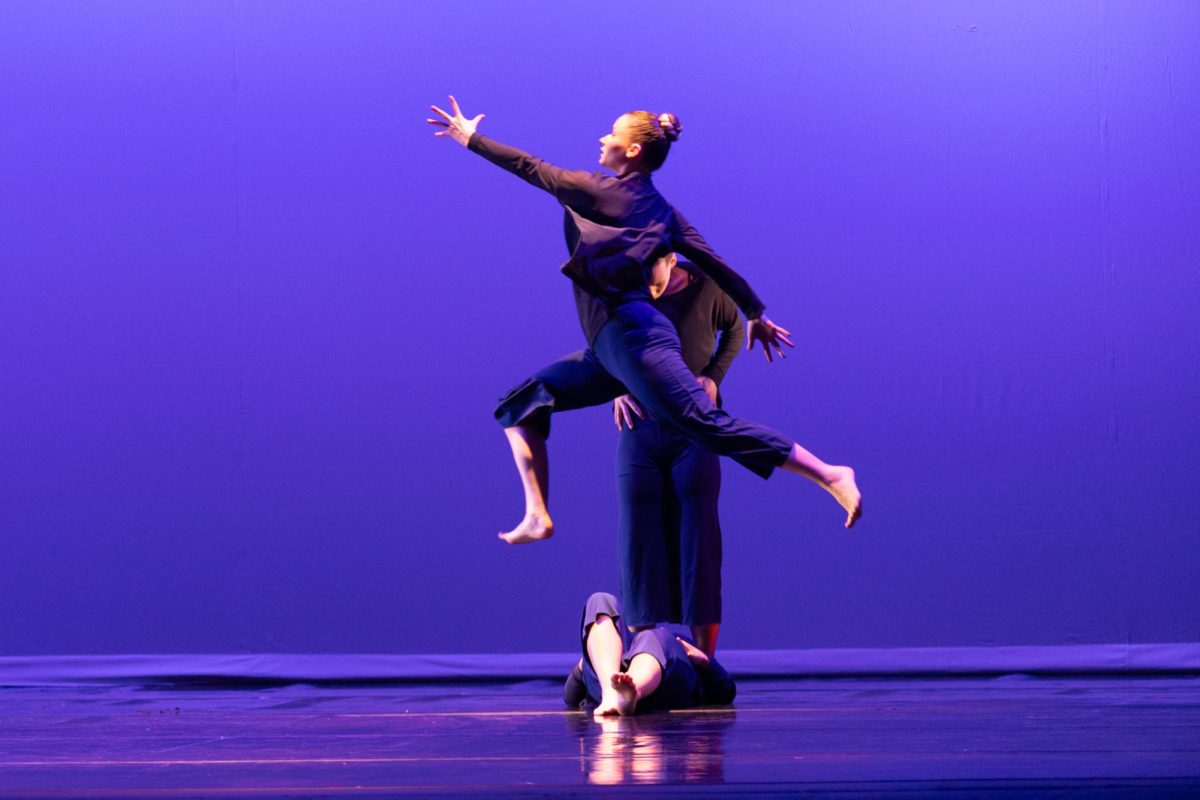 Tabitha Buffalo leaps across stage performing Clear Elevation (World Premiere) by guest choreographer Darrell Grand Moultrie at the Wichita Contemporary Dance Theatre on April 25.