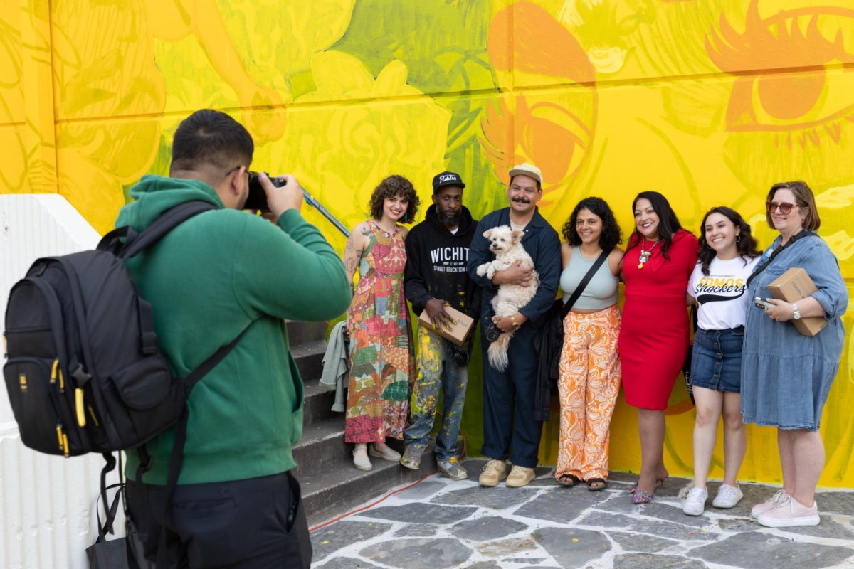 The team behind the Duerksen amphitheater Adelante Juntos- Forward Together mural poses for a photo at the unveiling on May 3. Though the event, which doubled as a Cinco De Mayo celebration, was in celebration of the mural, its expected to be officially completed on May 10.
