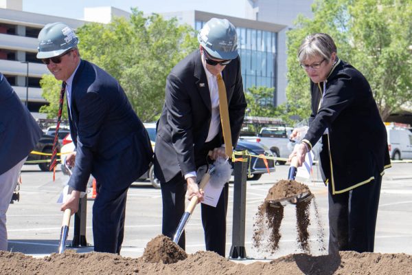 Wichita State President Rick Muma and Governor Laura Kelly break ground on the Wichita Biomedical Campus during a ceremony hosted on Wednesday. The duo was joined by more than a dozen other Kansas policymakers, elected officials and university administrators.