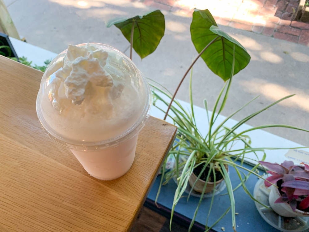 A rose Italian cream soda from R Coffeehouse, a family-owned cafe located on 1144 N Bitting Ave, Wichita KS. The coffee shop offers an assortment of drinks, both hot and cold, as well as sandwiches, pies and cakes.