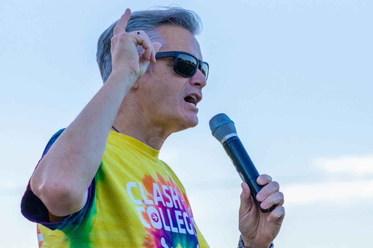 Wichita State University President Rick Muma gives a welcome speech at the 10th annual Clash of the Colleges on Aug. 23 held in Cessna Stadium.