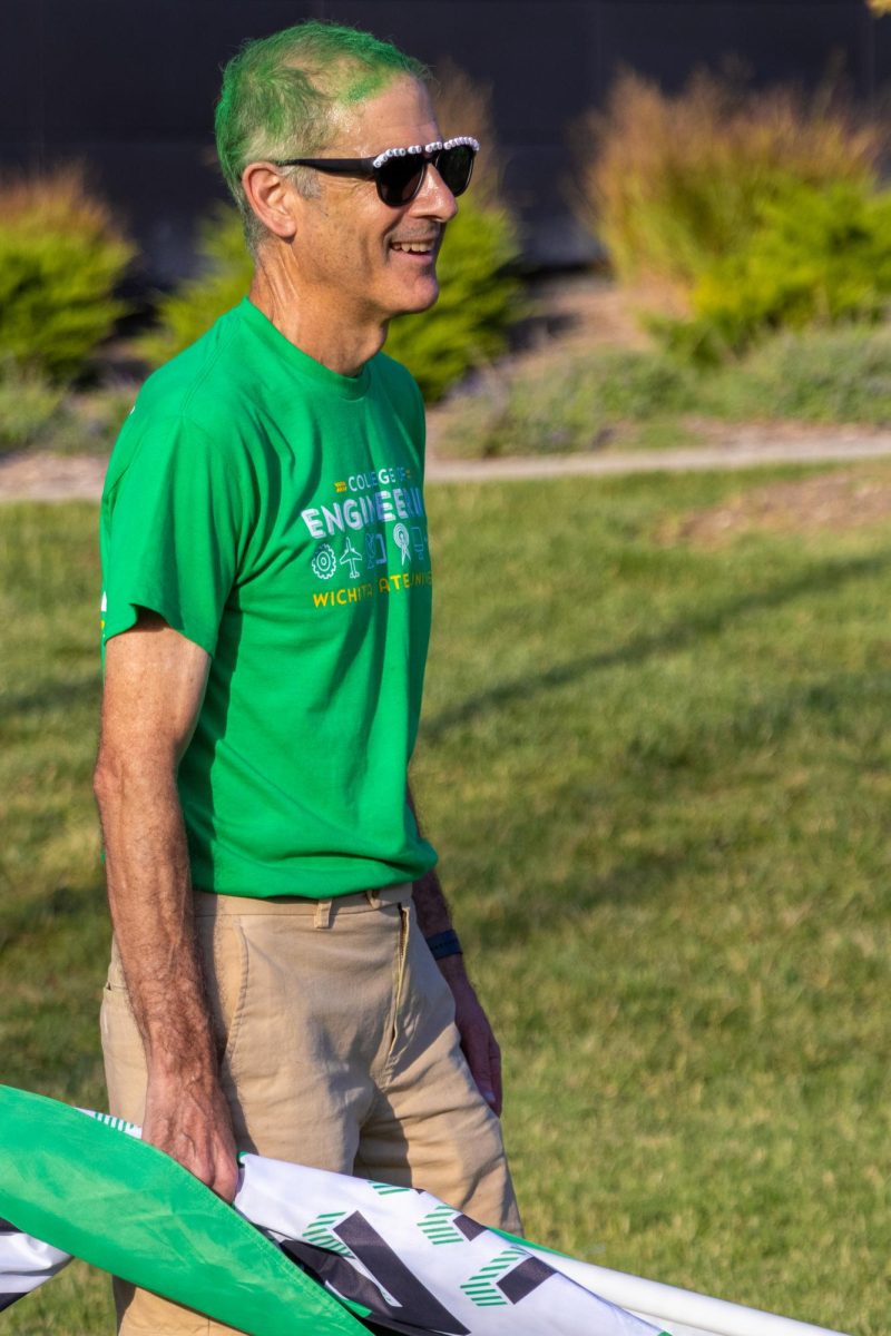 Anthony Muscat with his hair died green for Clash of the Colleges 2024.