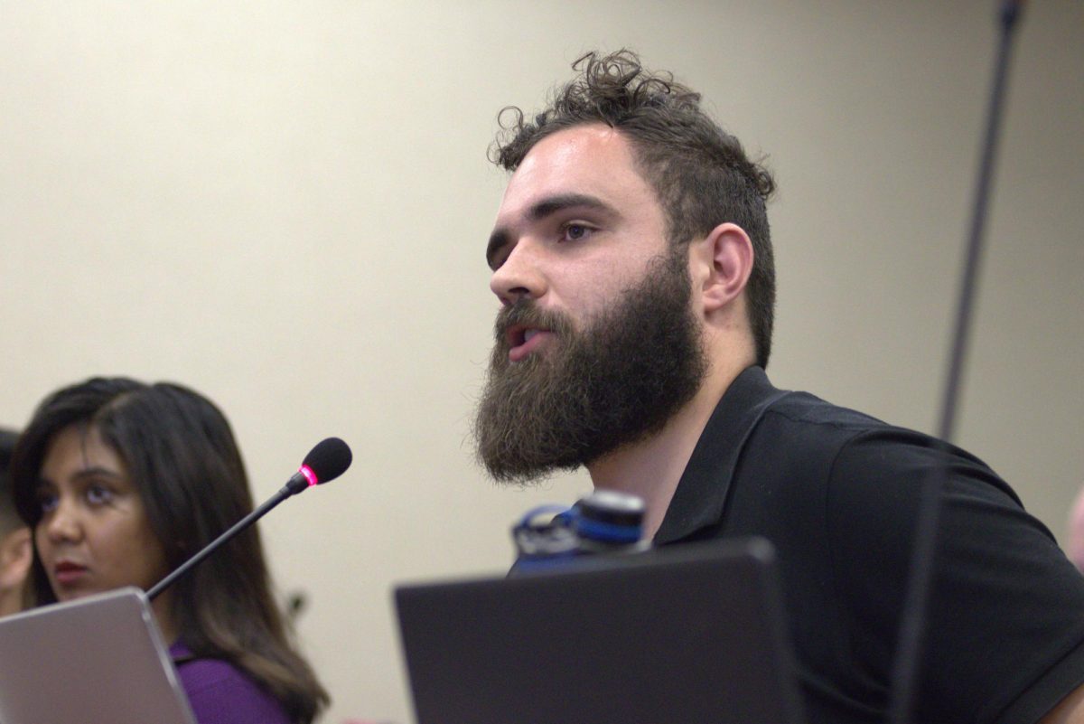 Student Government Association Sen. Andrew Bobbitt answers a question during the Senate meeting hosted on Aug. 21. Bobbitt authored three different pieces of legislation, one of which was a resolution encouraging the university to reconsider the location of the new pickleball courts.