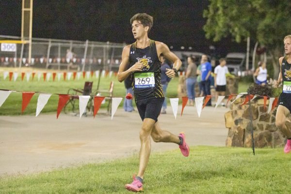 Sophomore Jonah Allison runs the Terry Masterson Twilight Classic in Hutchinson, Kansas. Allison placed 14th in the men's four-mile with a 20:48.73 time.