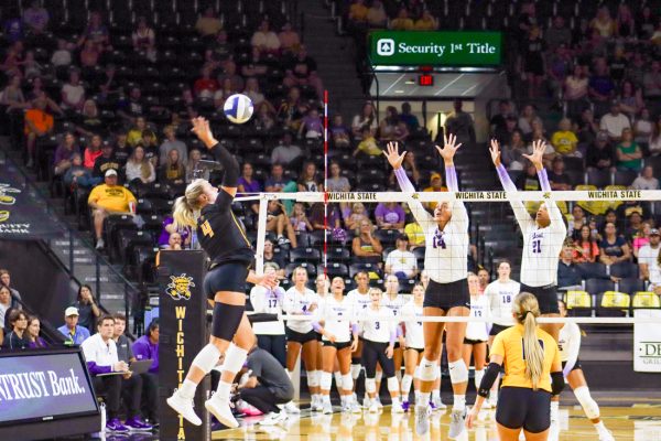 Junior outside hitter Brooklyn Leggett attempts a kill on Aug. 24 against Kansas State University.