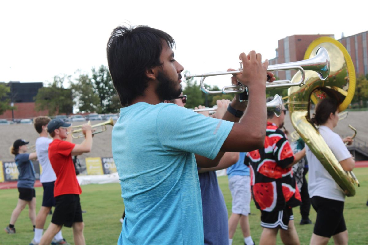 Alexander Barnett practices marching with the Shocker Sound Machine at band camp on August 13. The band camp was a week-long under the direction of Lucas Hulett, Director of Athletic Bands.