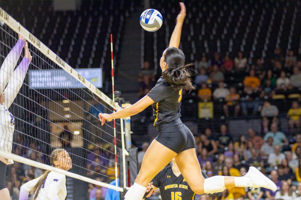 Fifth-year middle blocker Sarah Barham attempts a kill against Kansas State on Aug. 24. Barham finished with one kill on 10 attempts.