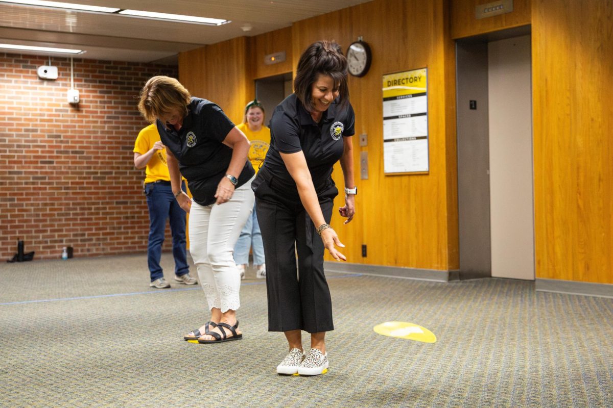 Shirley Lefever and Ashlie Jack play poly spot relay, essentially a game of "the floor is lava." Lefever and Jack both work in the provost's office, Lefever as the provost and Jack as the senior associate vice president for institutional effectiveness and strategic enrollment management.