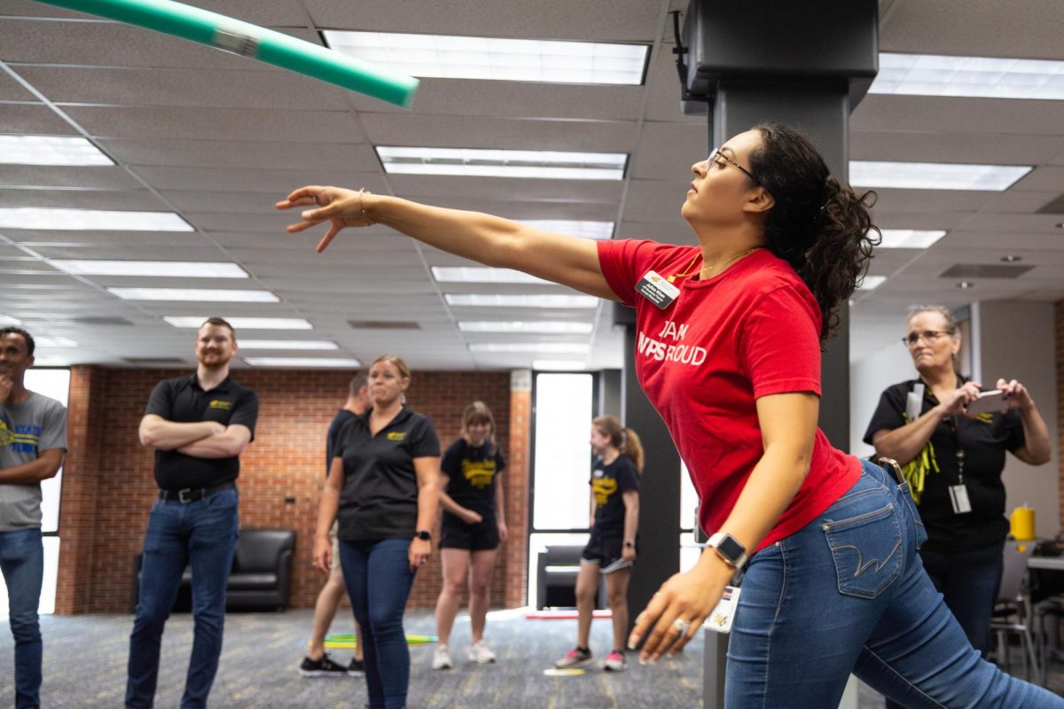 Julisa Khan makes one final attempt to make her javelin toss. Khan is a human resources business partner at Wichita State.