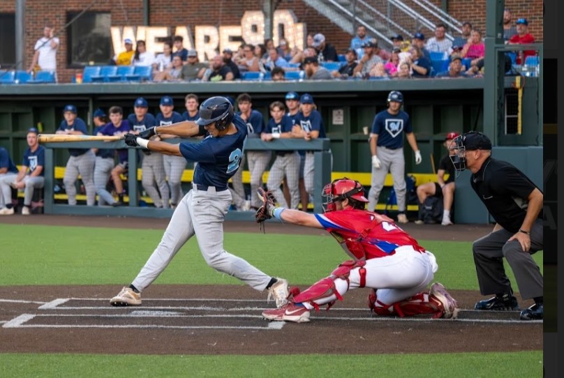 Jaden Gustafson hits for the Hutchinson Monarchs over the summer. (Photo courtesy of Andrew Carpenter / Digital Fox Photography)