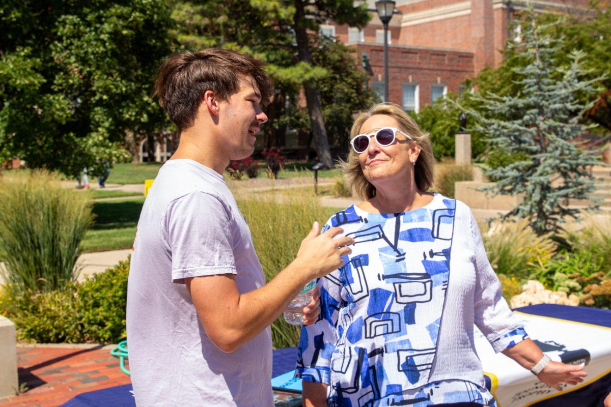 Andrew Lathem and Vice President for Student Affairs, Teri Hall speak about Lathem's fraternity. 