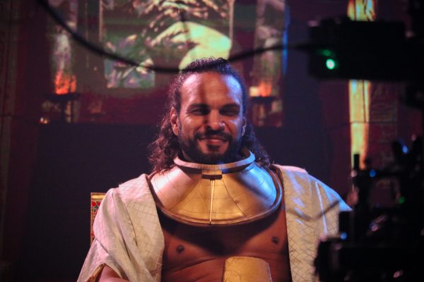 Dressed in ancient Egyptian attire, Corey Calloway acts out a game scene for viewers at the "Synthetic Scenes" open house on Sept. 5. As the camera moved in on Calloway, the back screen zoomed out, presenting the synthetic scene's seemingly real background.