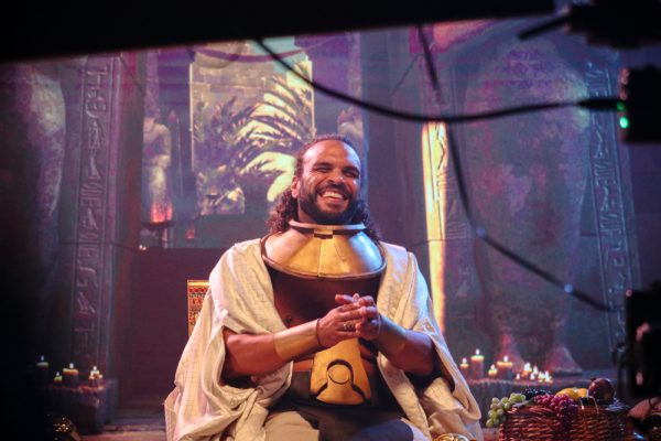 Actor Corey Calloway laughs as a man bows down at him off-camera. Viewers were asked to take part in the synthetic scene as a way to immersive themselves in the experience. 