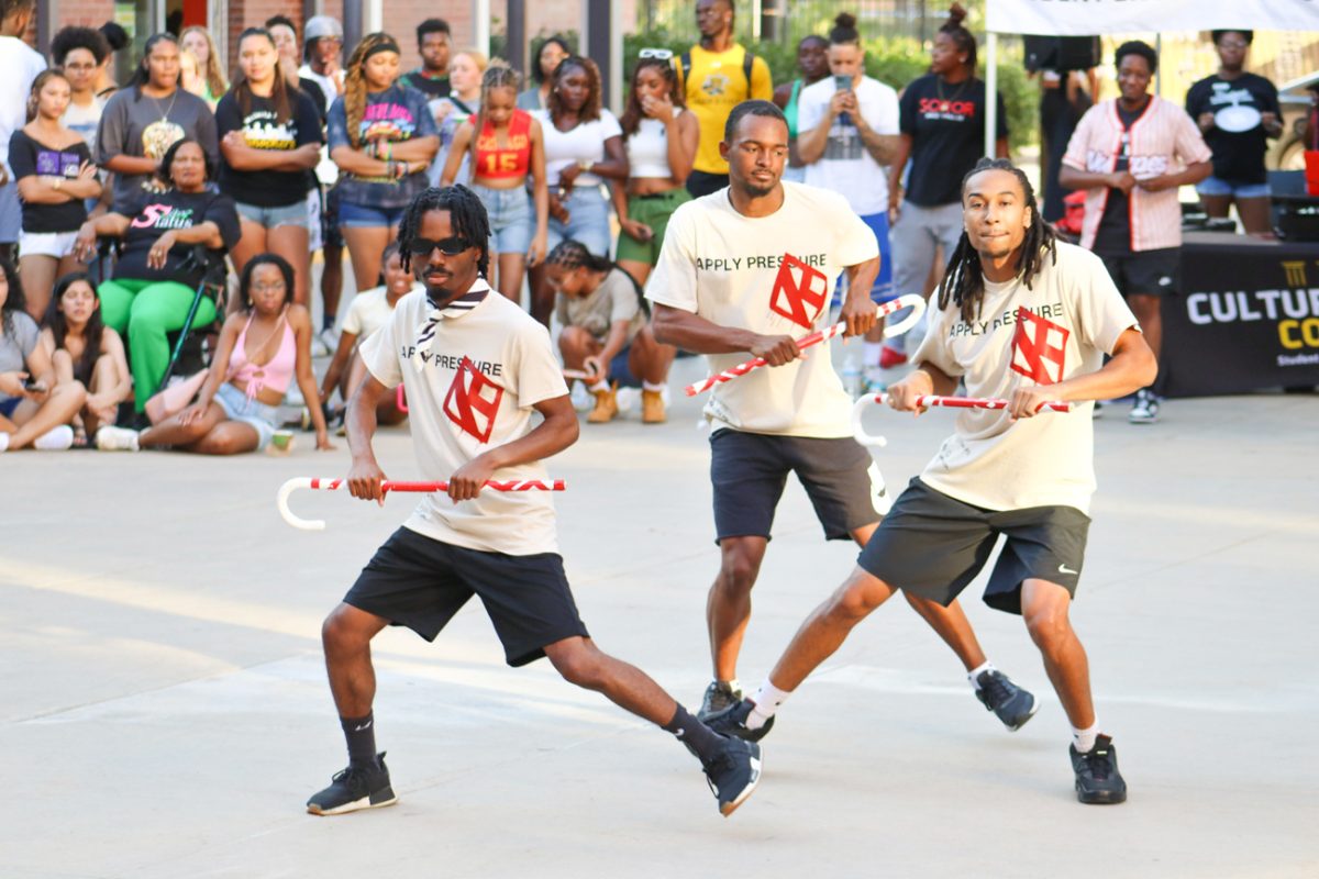 Junior Cameron Woodard, senior Chai Savage and senior Marshall Underwood shimmy during the yard show. Woodard shared his experience when preparing for the show: “We thought of a very funny way to end our show to make it more entertaining.”